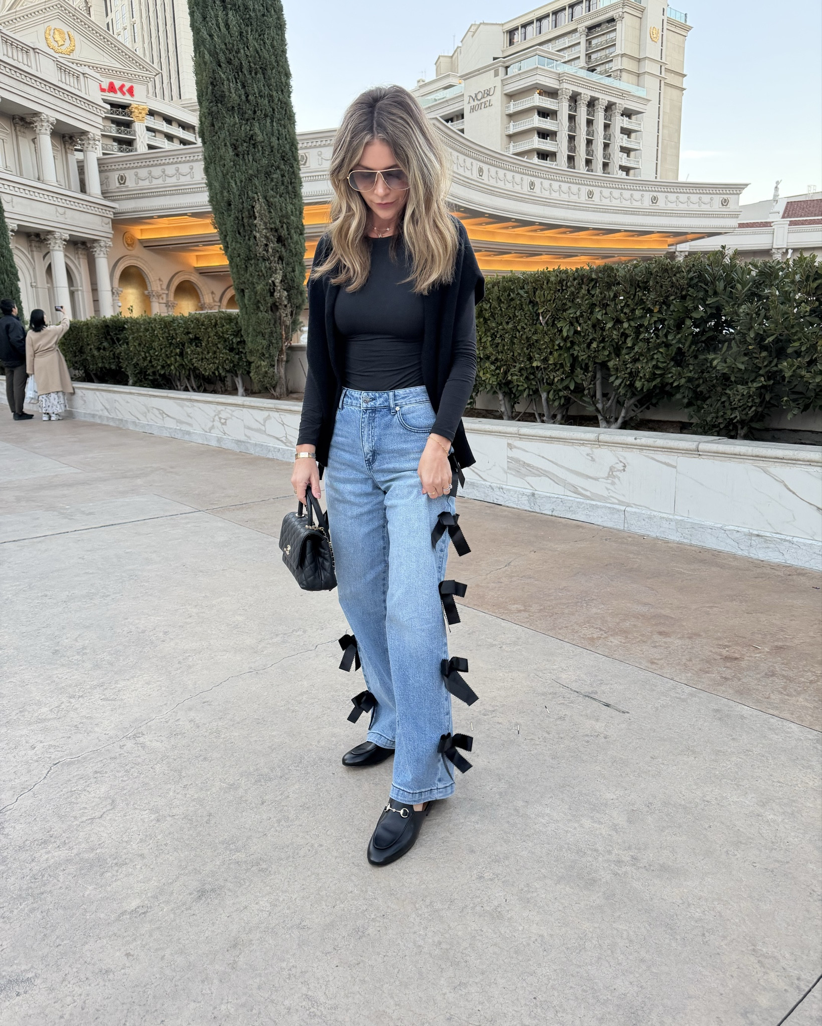  Vegas day time outfit!! 
Loving these fun bow jeans. Size 25/0
Amazon bodysuit
Aritzia sweater 
Gucci loafers
Miu miu sunglasses 

#LTKootd #LTKTravel #LTKPetite
