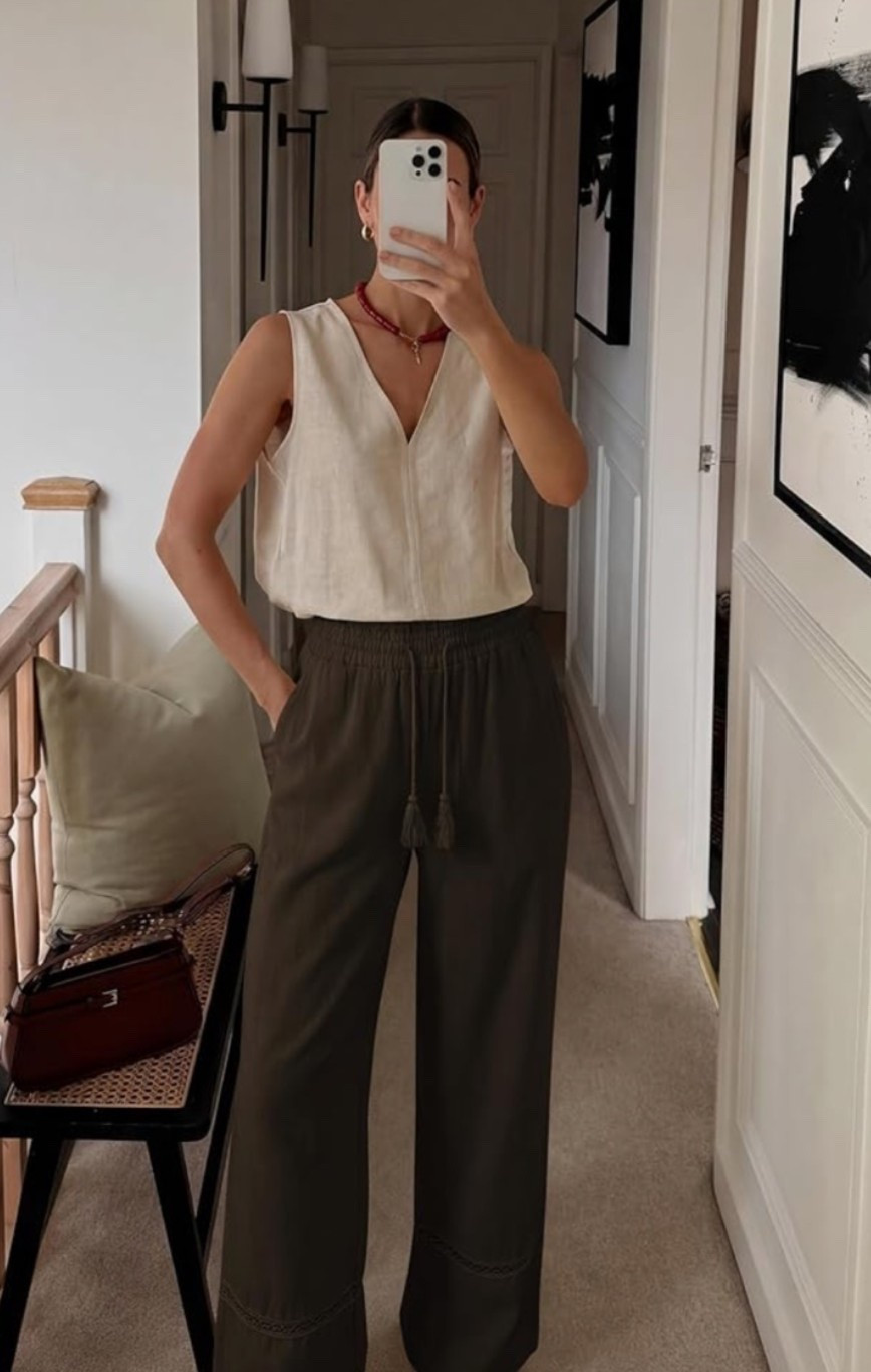 High-waisted linen palazzo pants with that breezy summer outfit casual feel. ☀️ Perfect for beach trips, travel days, errands, casual weekends, coffee runs, Friday workwear, or warm-weather outfits when you want something lightweight, comfortable, and still put together. The drawstring waist, wide leg shape, and pockets make them easy to style with tanks, tees, blouses, or sandals. 

Grab these pants if your summer closet needs a relaxed pair you can wear from beach days to casual Fridays. 🤎

#LTKOver40 #LTKTravel #LTKWorkwear