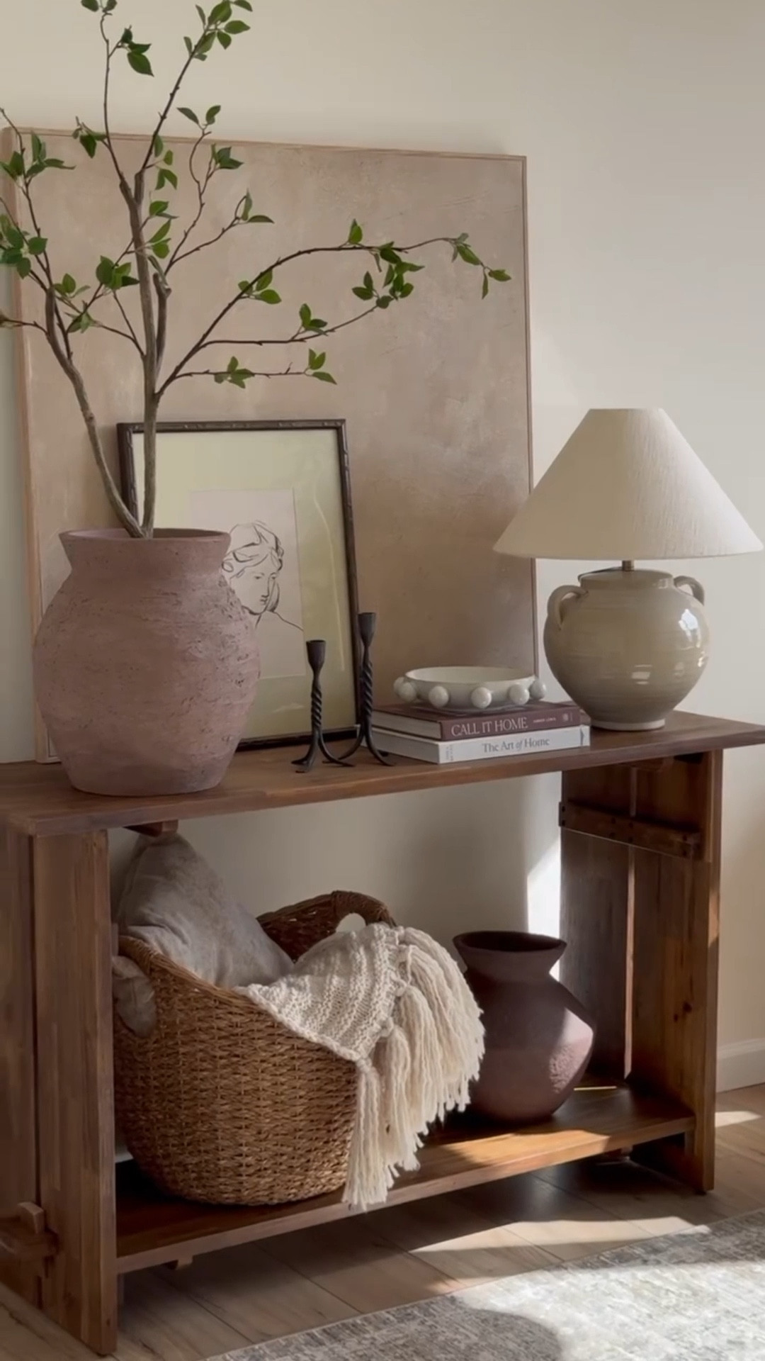 I was looking for console table for my mudroom space and finally scored the prettiest one. The wood tone is perfect and the material feels solid!🤎

#LTKHome #LTKSaleAlert #LTKWatchNow