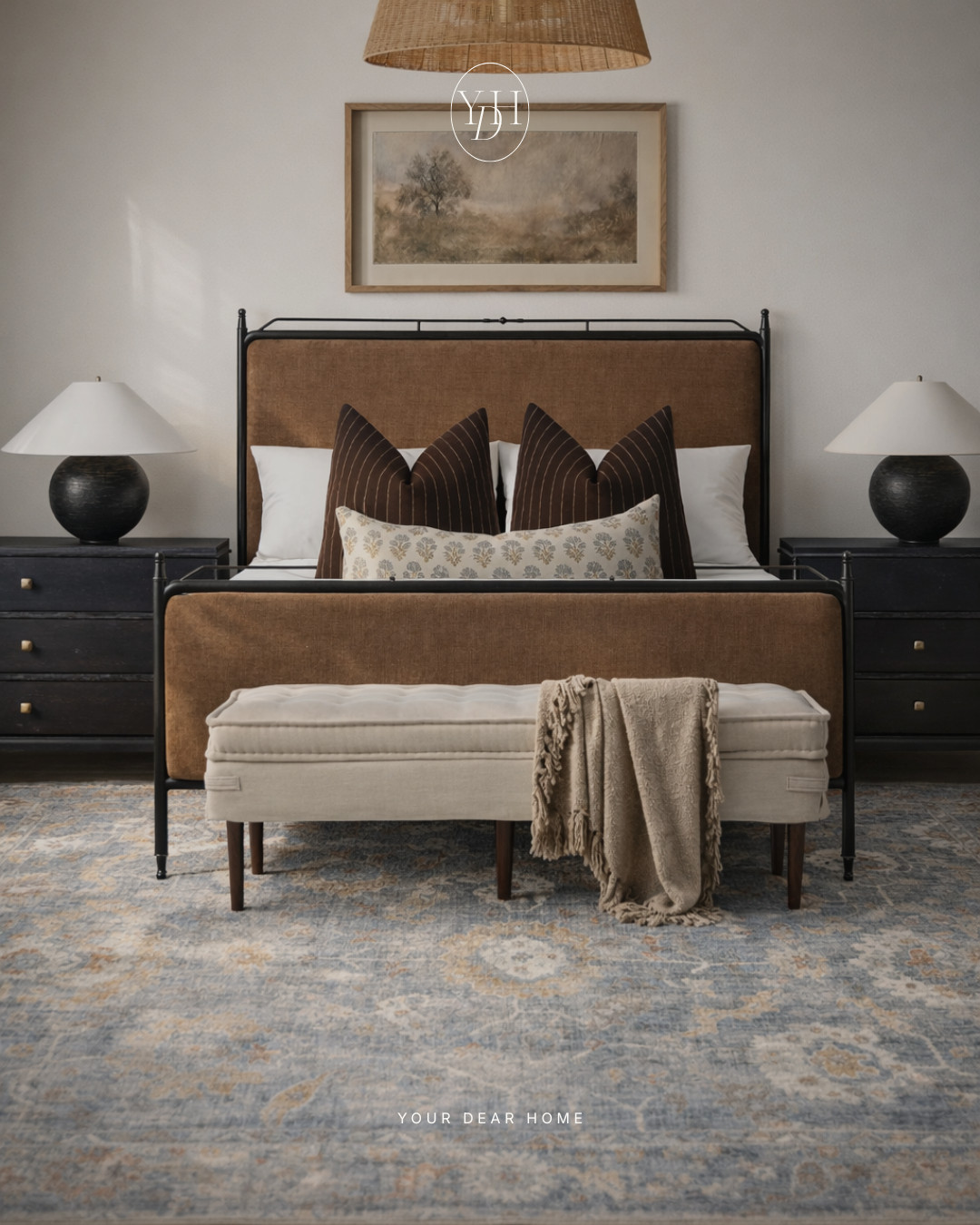 I love how this bedroom mixes darker tones with softer textures. The black nightstands and brown bed frame add depth while the lighter rug and upholstery keep everything balanced and cozy. 

 #LTKHome