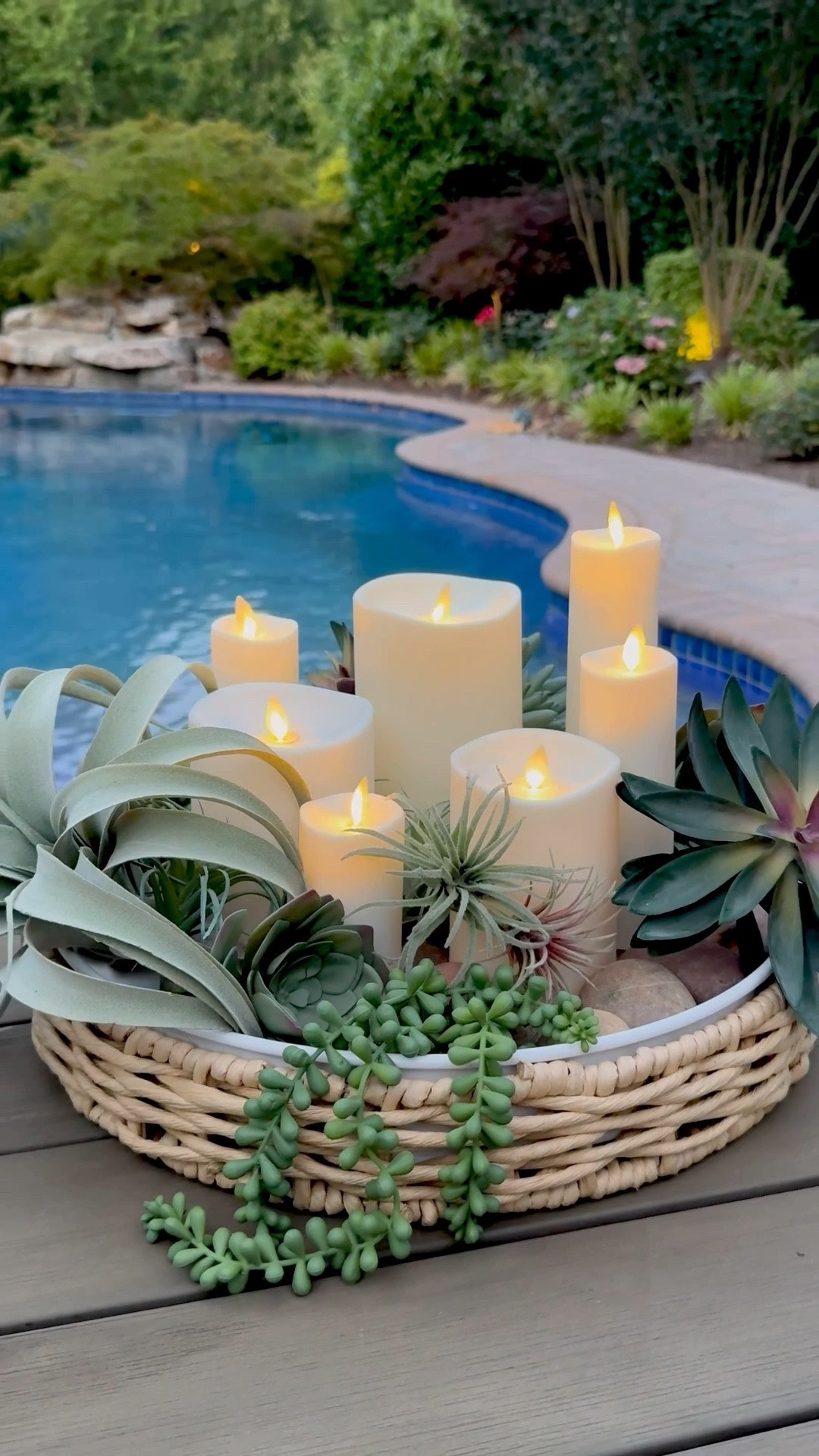 Succulent Candle Garden 💚One of my favorite ways to elevate an outdoor table. Clustering flameless candles with faux succulents and river rock creates a warm, garden-inspired centerpiece that’s beautiful from day to night.

#LTKHome #LTKSeasonal
