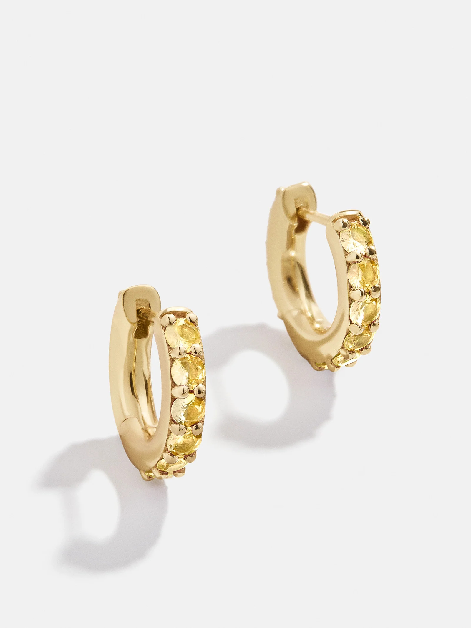 18K Gold Birthstone Huggie Earrings - Topaz | BaubleBar