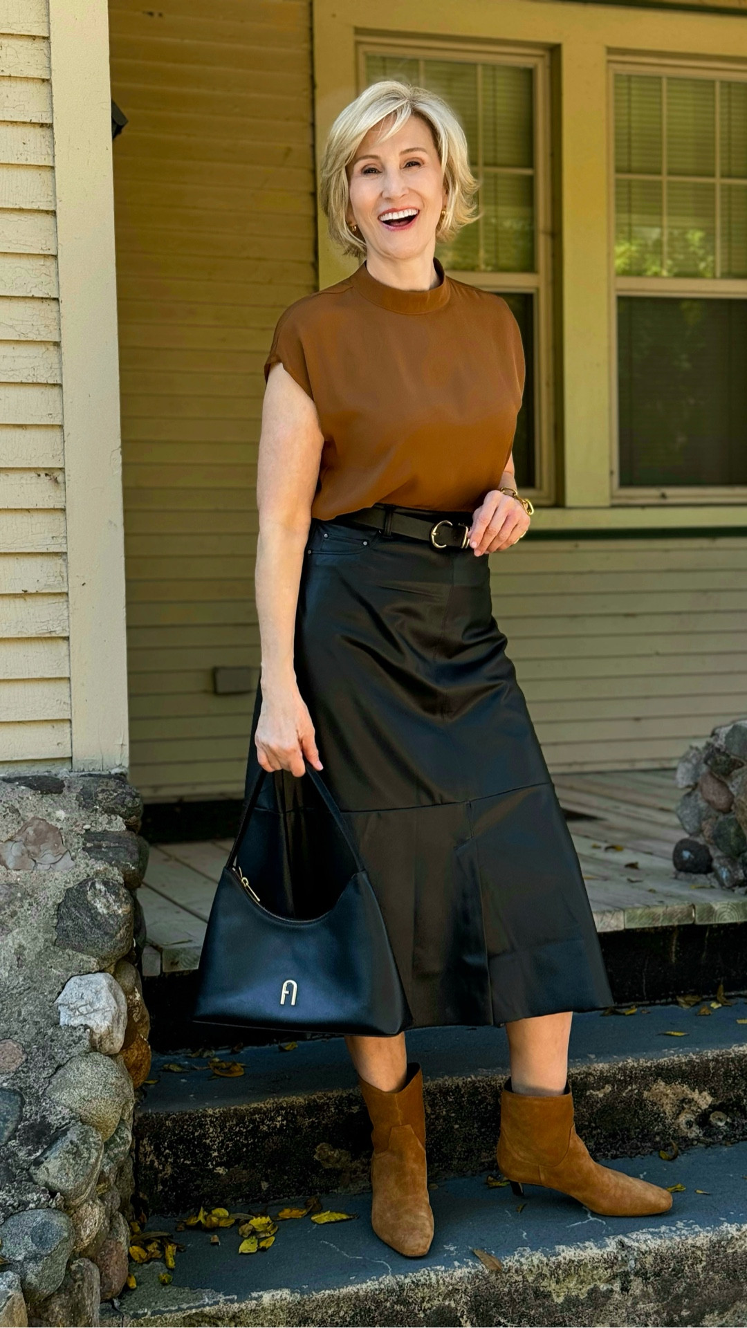 There’s something about camel tones that just feels effortlessly polished 🤎 This short sleeve knit is soft, easy, and somehow makes getting dressed feel simple again. I paired it with this faux leather skirt from Lysse New York for a little edge, then finished with my favorite camel suede booties.

It’s proof that comfort and confidence can live in the same outfit. Would you wear this for brunch, date night, or just because? ✨

#LTKootd #LTKSeasonal #LTKOver40