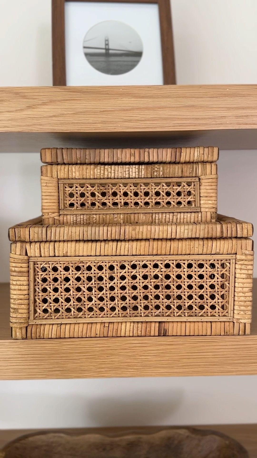 These rattan storage boxes make for beautiful shelf decor, and are perfect for hiding small things like ￼remotes!

#LTKHome