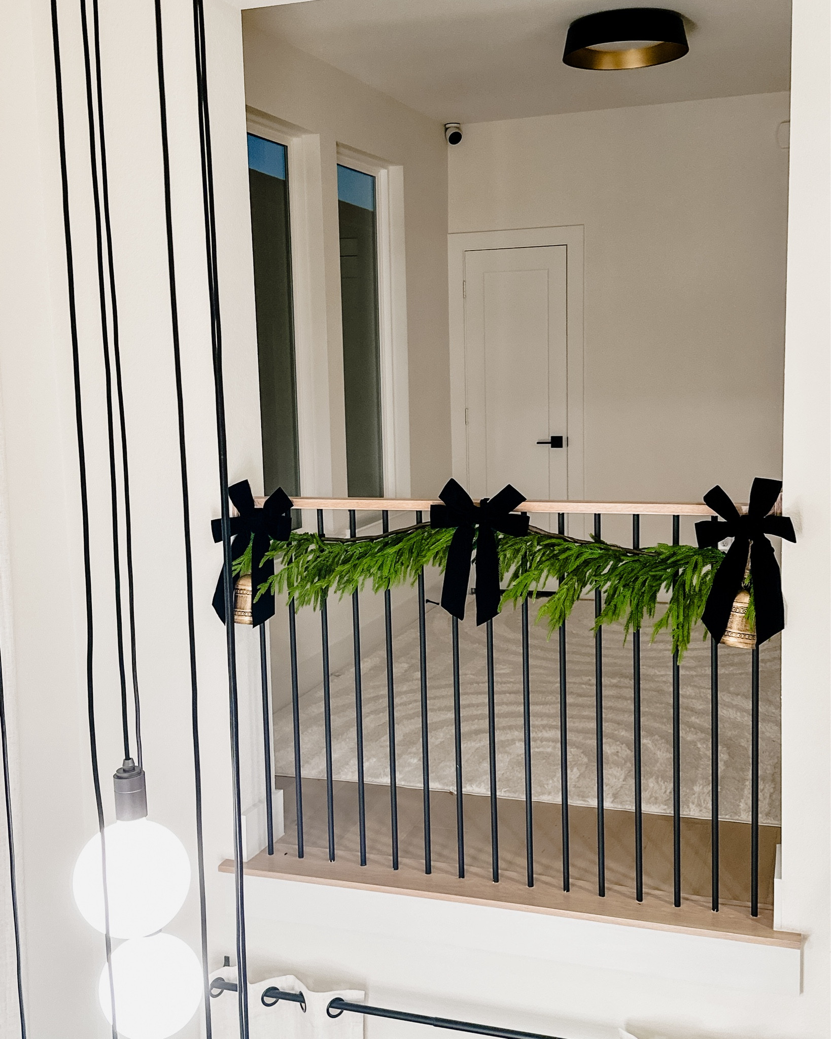 There’s something about a pine garland that gets you in the festive mood! Love this simple yet chic setup using a faux Norfolk Pine garland, antique brass bells and velvet bows. #garland #velvetbow #christmasdecor #christmas #holidaydecor #homedecor #pinegarland #holidays #brass #antique

#LTKHome #LTKSeasonal #LTKHoliday