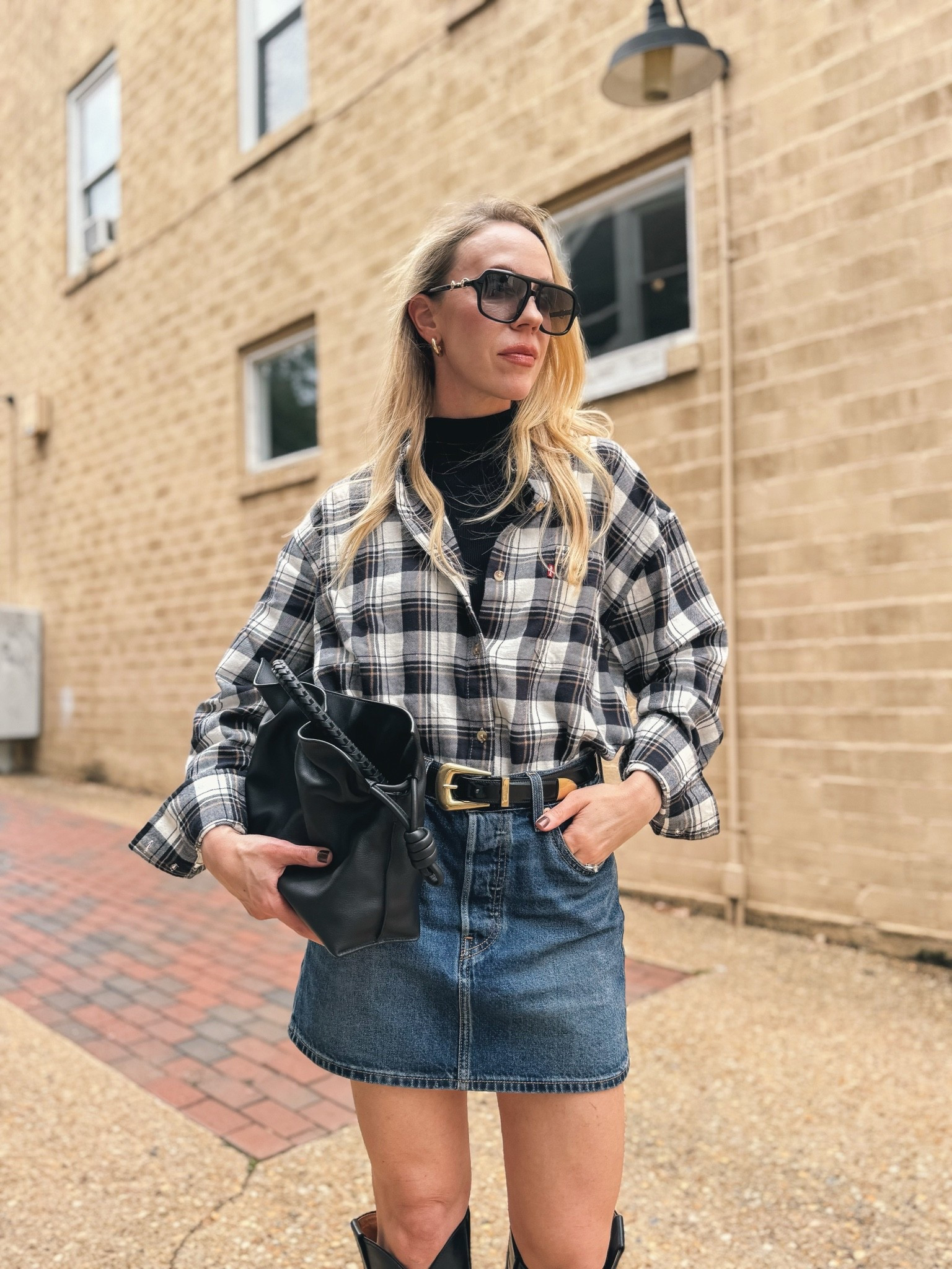 Flannel shirt fall outfit with denim mini skirt and cowboy boots @levi

#LTKSeasonal #LTKSaleAlert #LTKOver40