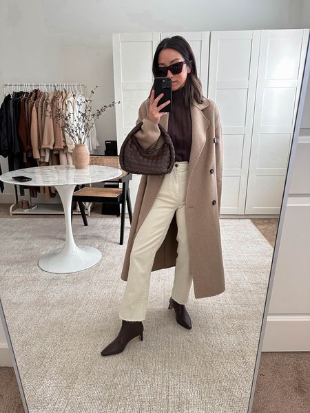 Shades of brown. Loving this ribbed turtleneck from j.crew. This chocolate brown color is actually hard to find. Boots are sold out but linked a very similar pair. 

Coat - Mango xxs
Sweater - j.crew xs
Jeans - Dl1961 25. Go tts. 
Boots - J.crew 5
Bag - Anthropologie 
Sunglasses - Celine 