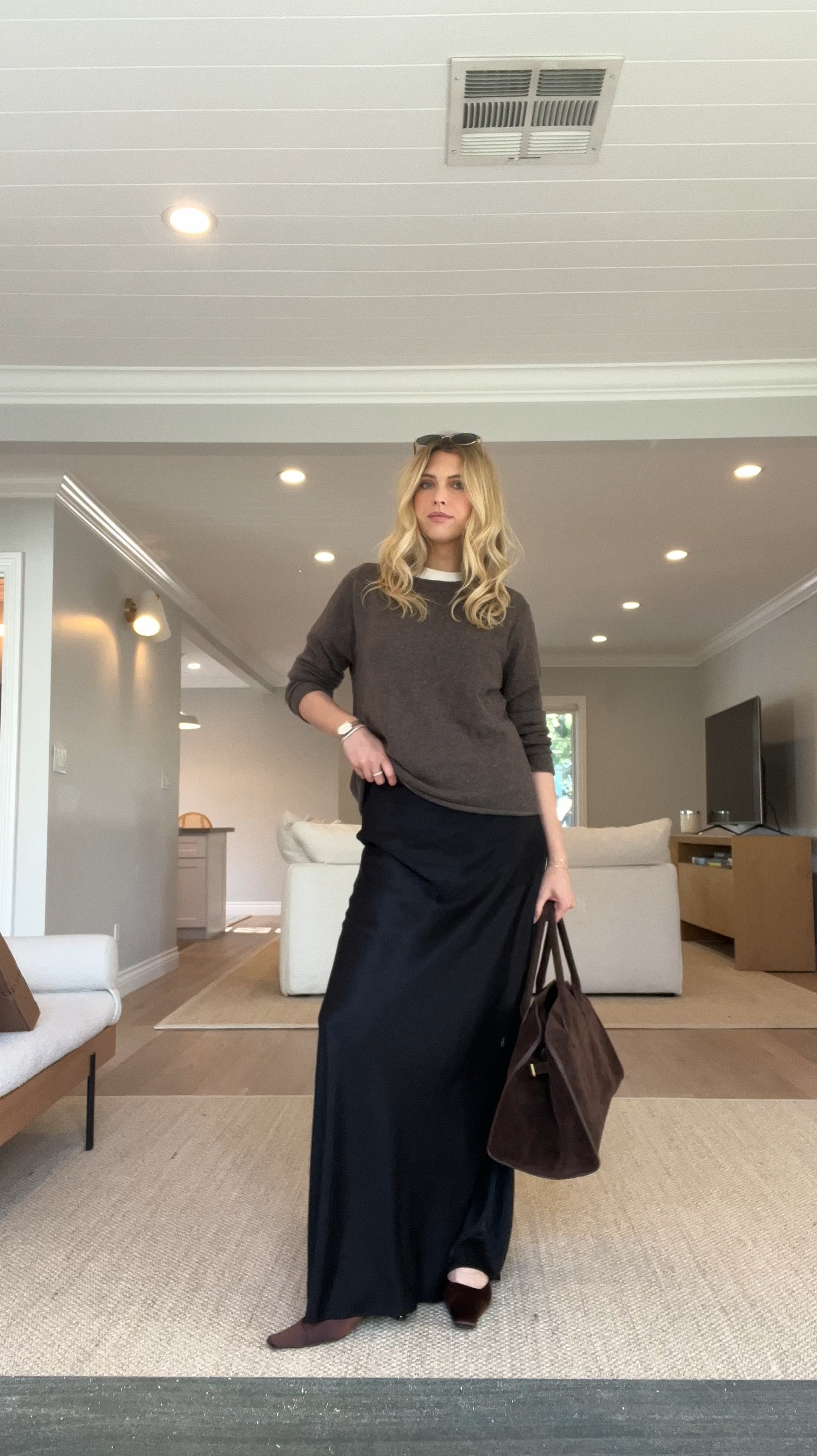 Fall office and casual comfy chic outfit. Reformation black silk maxi skirt (S). Vintage looking boyfriend sweater from reformation (XS). $24 suede tote bag the row dupe 

Fall fashion inspiration / fall trend / fall purse 

#LTKFindsUnder50 #LTKSeasonal #LTKVideo
