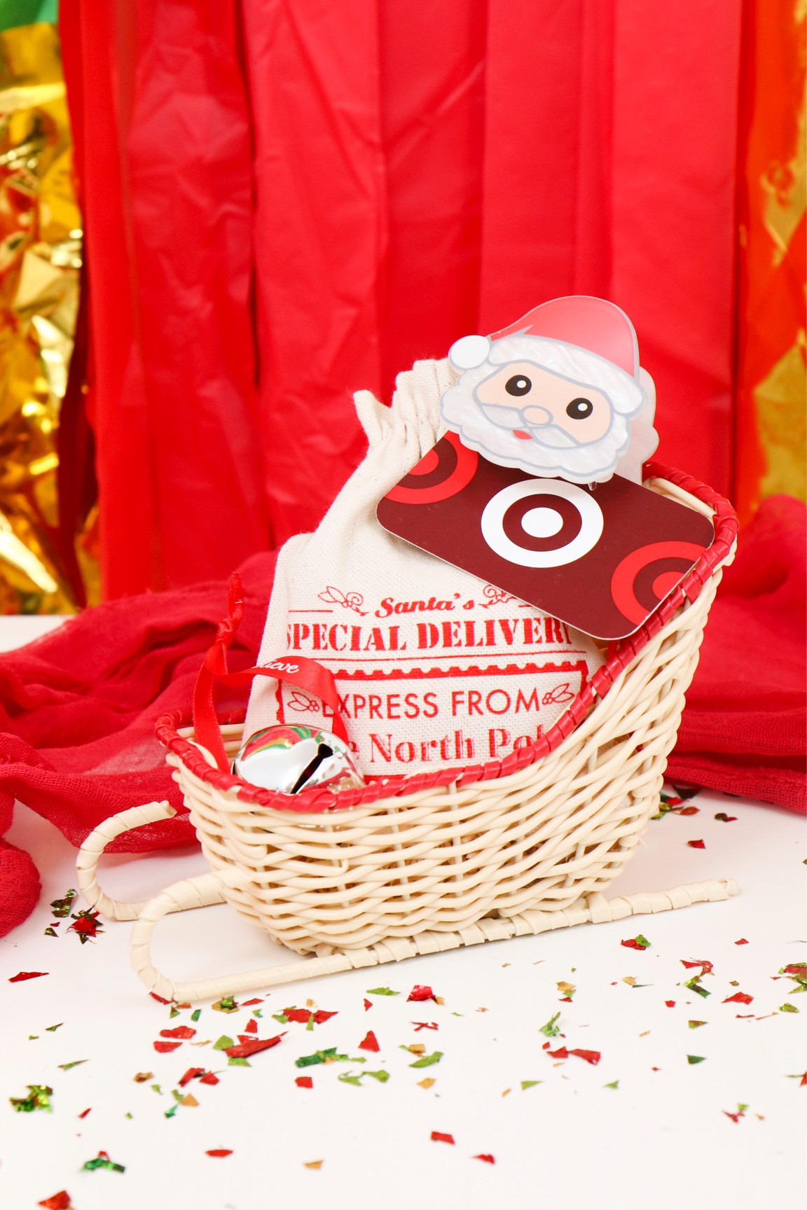 Easy Holiday Teacher Gift (delivery driver or church friend….!) - Using these cute little wicker sleighs from Target! Add a delivery bag from Santa filled with chocolates  & clip on a gift card with the cutest Santa claw clip! The last detail, a “Believe” bell… 
🎅🏻🎅🏻🎅🏻

🍬🍬🍬
#teachergift #holidayteachergift #holidayteachergiftideas#holidaygiftideas #dollartreedecor #holidaydecor

#LTKHoliday #LTKSeasonal #LTKGiftGuide