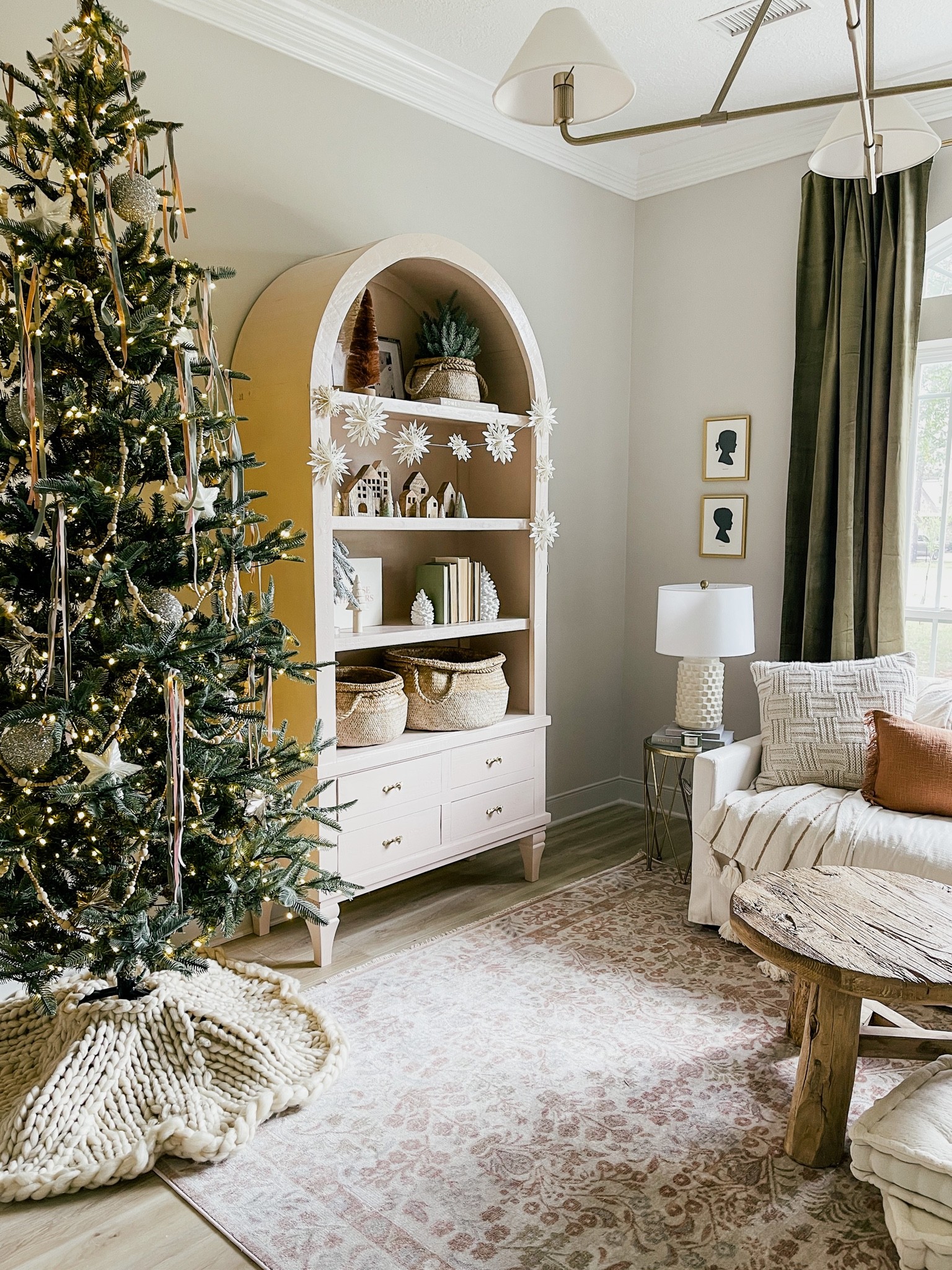 Christmas living room holiday decor Christmas tree rug shelf sofa pillows 

#LTKhome #LTKHoliday #LTKSeasonal