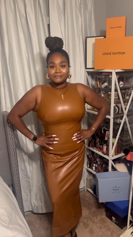 This viral Amazon faux leather midi dress is a fall must have! Paired with the large teardrop earrings for an added look of sophistication ✨ 

#LTKmidsize #LTKFind #LTKunder50