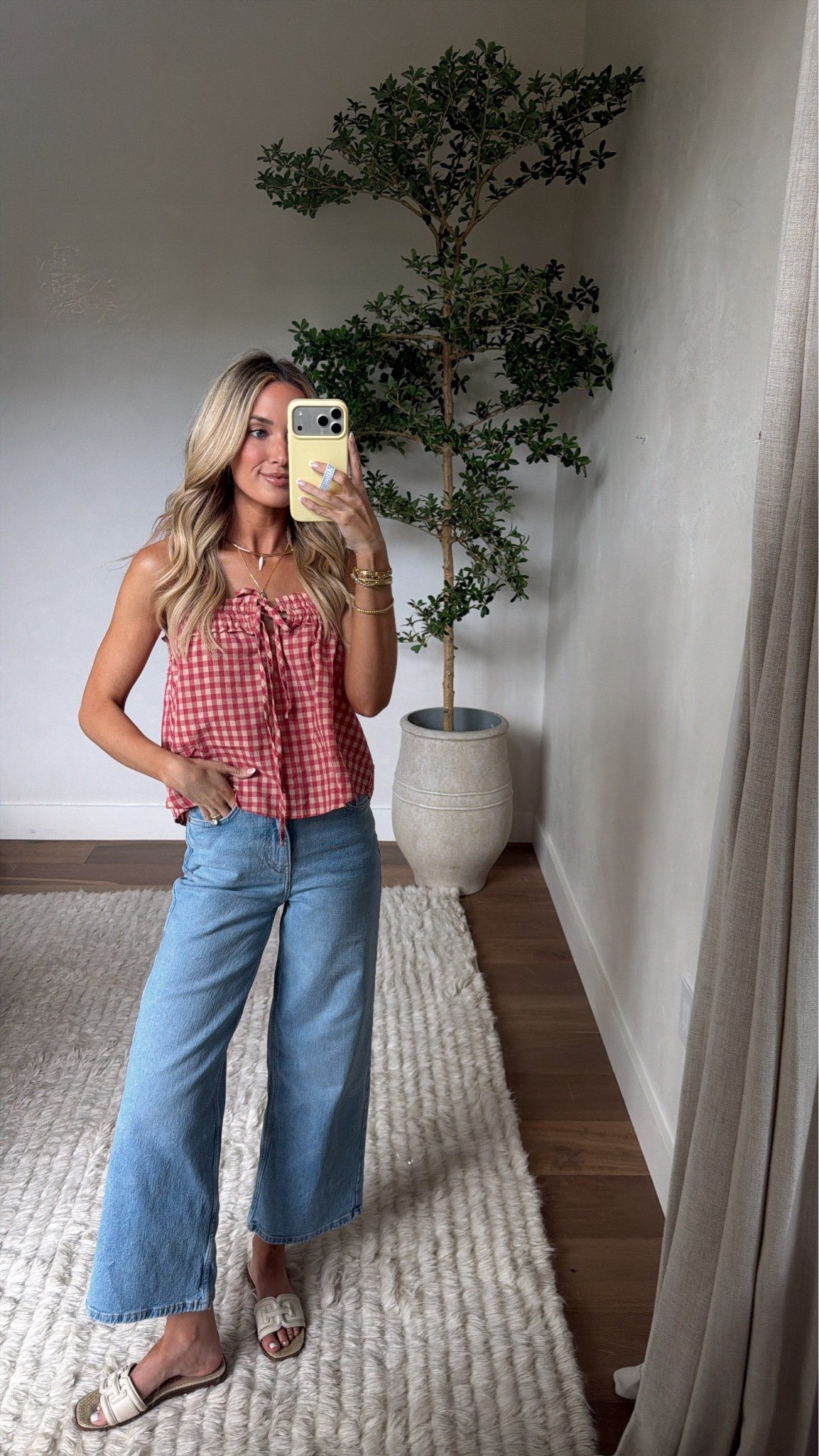 Wearing S in tank 
0 in jeans