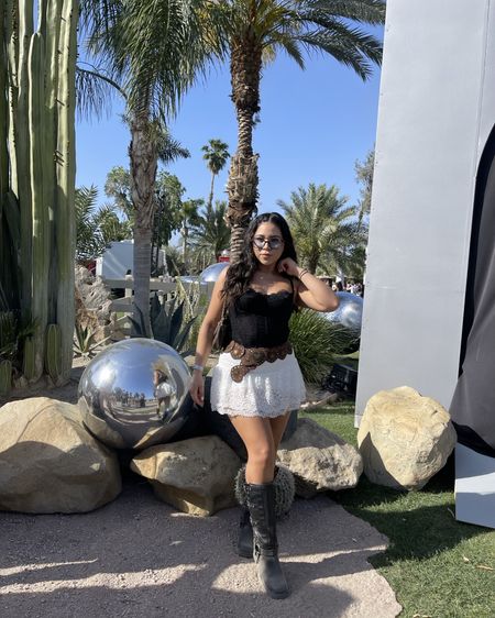 Coachella outfit 
Corset top: medium 
Lace skirt: small 
Biker boots: 6.5 
Belt: small
Sunglasses 

#LTKSeasonal #LTKfindsunder100 #LTKFestival
