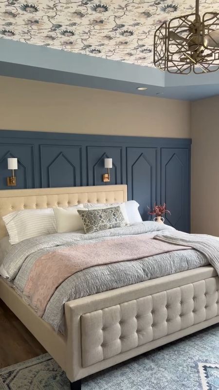 Jo transformed her bland main bedroom into a colorful, yet relaxing, retreat. The highlight is the diamond trim accent wall. She pulled the color scheme from the wallpaper and added chic sconces and a new bed with bedding to finish it off. #bedroomdecor #wallpaper #diy #diyhome

#LTKhome
