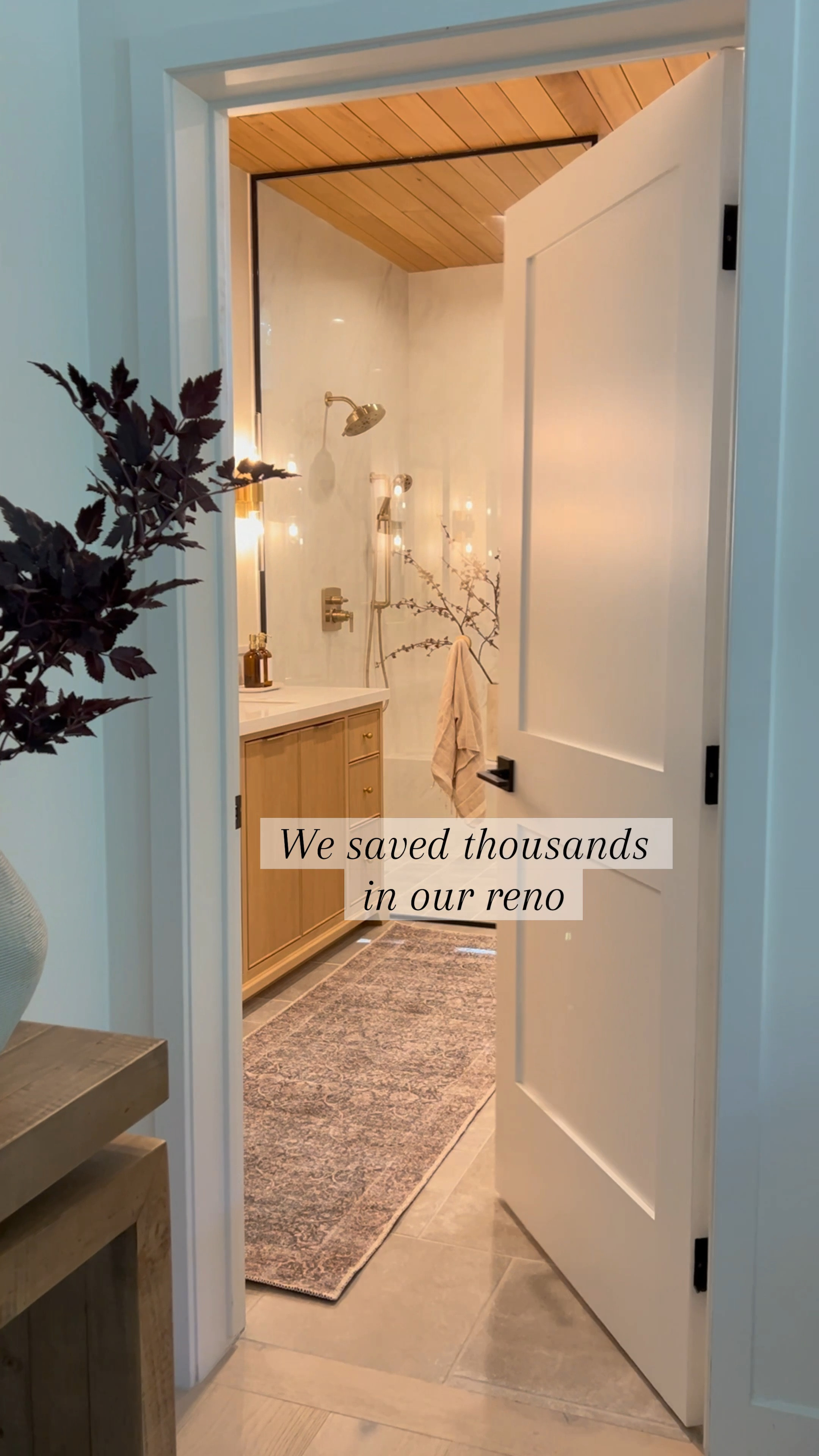 Remodels can be expensive! We saved thousands of dollars using these affordable levers and doors which are currently on sale for Wayfair way day until Monday! I’ve use these in almost all my clients homes and they’ve held up so well and it’s already been a few years. Bathroom design, white door, black levers, privacy, levers tile marble tile, Vaill pattern, black mirror, wood vanity