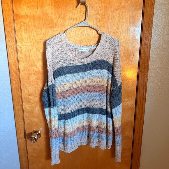 This item is a Knox Rose striped V-neck pullover sweater featuring a neutral-ton | Poshmark