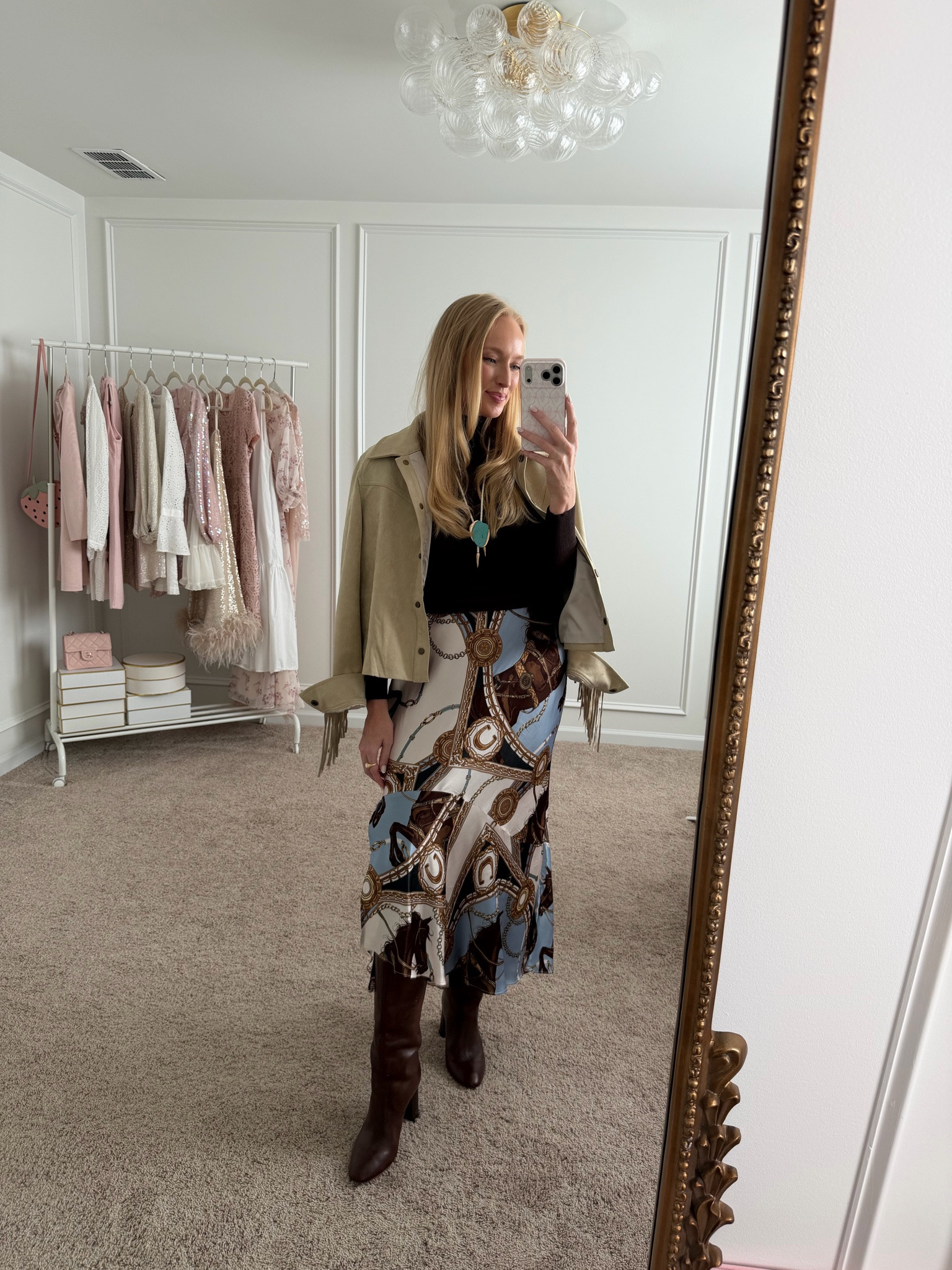 Such a fun printed skirt for fall! Wearing a size small and styled it with trendier western accessories like a fringe jacket and turquoise necklace. 

Elevated fall outfit // fall skirt // date night outfit

#LTKSeasonal