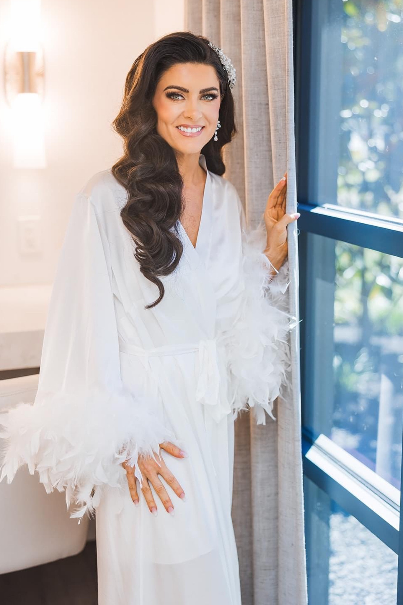 Absolutely loved my bridal robe with feather accents! White robe. Bride robe. Wedding day robe. Feather robe. Bridal outfits. Bridal accessories. 

#LTKunder100 #LTKwedding #LTKstyletip