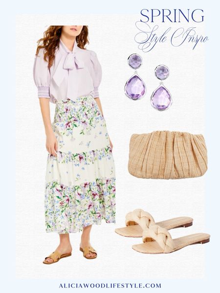 Floral skirt
Lavendar short balloon  sleeve 
Straw braided slide
Raffia clutch 
Purple Ippolita earrings 

#LTKSeasonal #LTKover40 #LTKstyletip