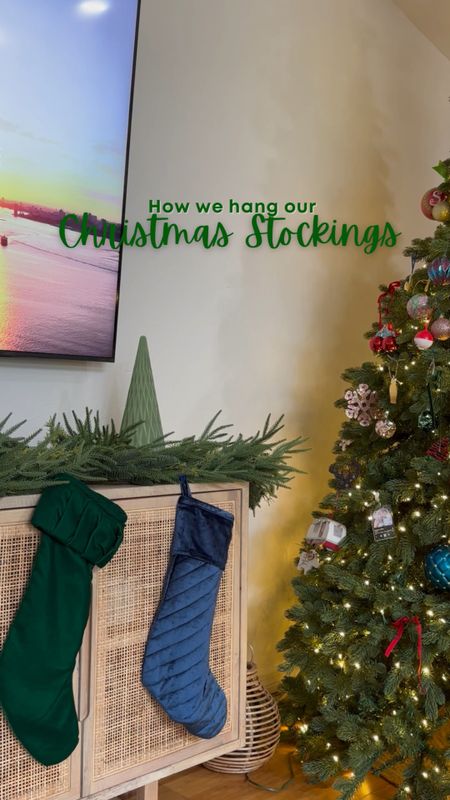 This might be very niche, but here is my no damage way to hang your Christmas stockings. Whether you have a mantle or not, but you don’t want to use nails or command strips to hang your stockings. This is the easiest and most aesthetically pleasing way to do it. I grabbed a roll of my pretty no wire Christmas ribbon and sign tied the loop of the stocking Around my fog garland. If you are in the market, this garland is stunning. I wouldn’t even recommend doubling it because it is so full and realistic looking. It is on Amazon prime. If you would like the link to the garland, our stockings, and our other Christmas decor, comment CHRISTMAS and I will send you the links. 🎄

#LTKHoliday #LTKSeasonal #LTKhome