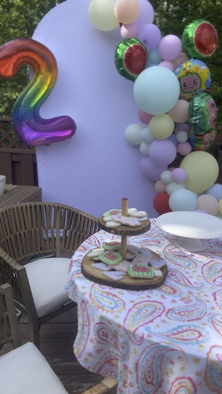 Outdoor patio set dining set neutral birthday decor balloons arch garland pastel kids toddler birthday party outdoors backyard 

#LTKSeasonal #LTKhome #LTKfamily