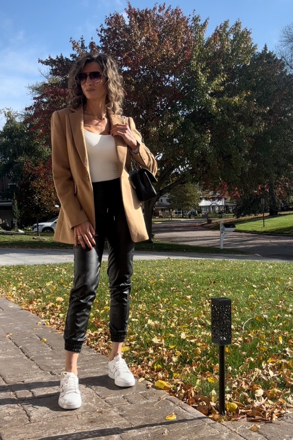 Casual cool today with these faux leather jogger. The one I’m wearing is old, so I found a few options that looks exactly the same!

The camel wool blazer / coat is the best one I’ve found for the best price! It fits true to size. I’m wearing size zero.

New balance sneakers fit small. Size up half a size.

Bodysuit fits true to size 


#LTKover40 #LTKfindsunder50 #LTKstyletip