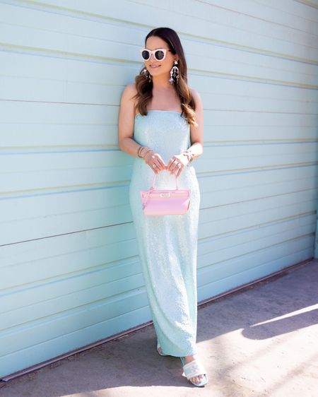 Shop this turquoise sequin tube dress and complementing slides for 30% off during the Tory Burch sale event

#LTKstyletip #LTKCyberWeek #LTKsalealert