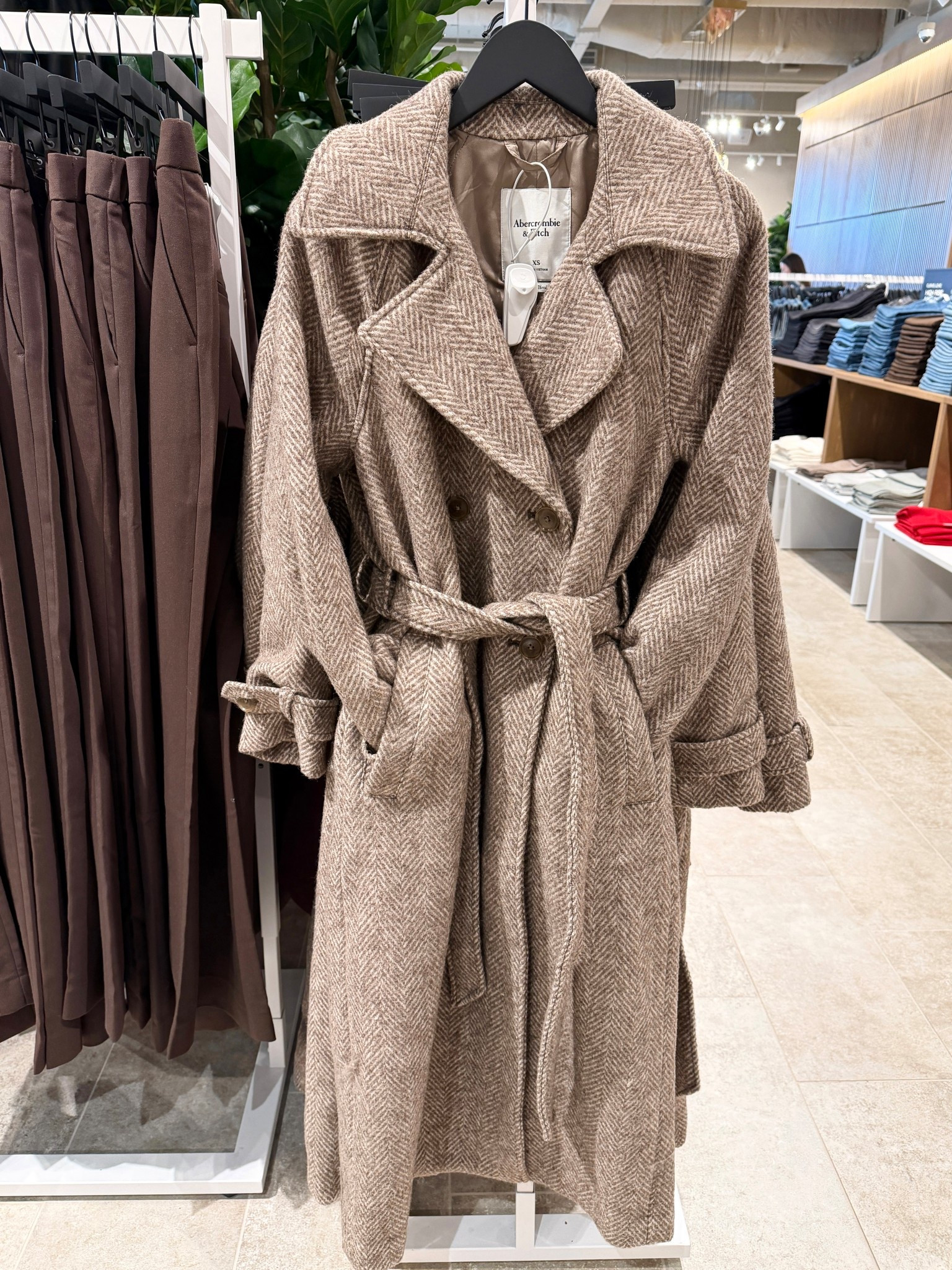 Such a chic winter staple! 🤎 The A&F Carrie Wool-Blend Trench Coat from Abercrombie & Fitch is currently on sale and it’s a really good one. This coat has that polished, high-end look with classic trench details, but it’s made from a cozy wool-blend that actually keeps you warm. 🫶🏻 The relaxed, longline silhouette works beautifully for workwear and feels just as stylish for everyday errands or office days. Shown here in the brown herringbone, but it comes in multiple colors and lengths so you can find the perfect fit. ☺️ I linked it here along with more great winter coat finds from the sale! 💫 #WinterFashion #TrenchCoat #Abercrombie

#LTKSaleAlert #LTKWorkwear #LTKPetite