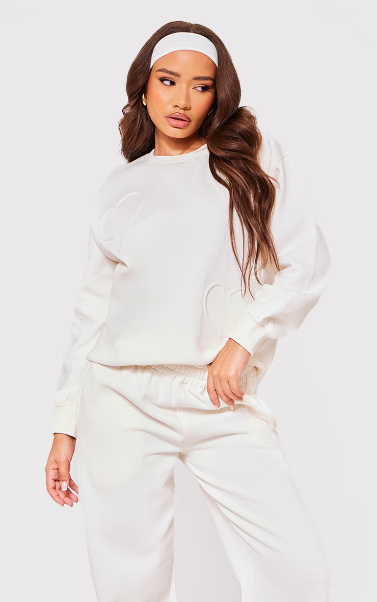 Petite Cream Embossed Heart Detail Sweatshirt | PrettyLittleThing UK