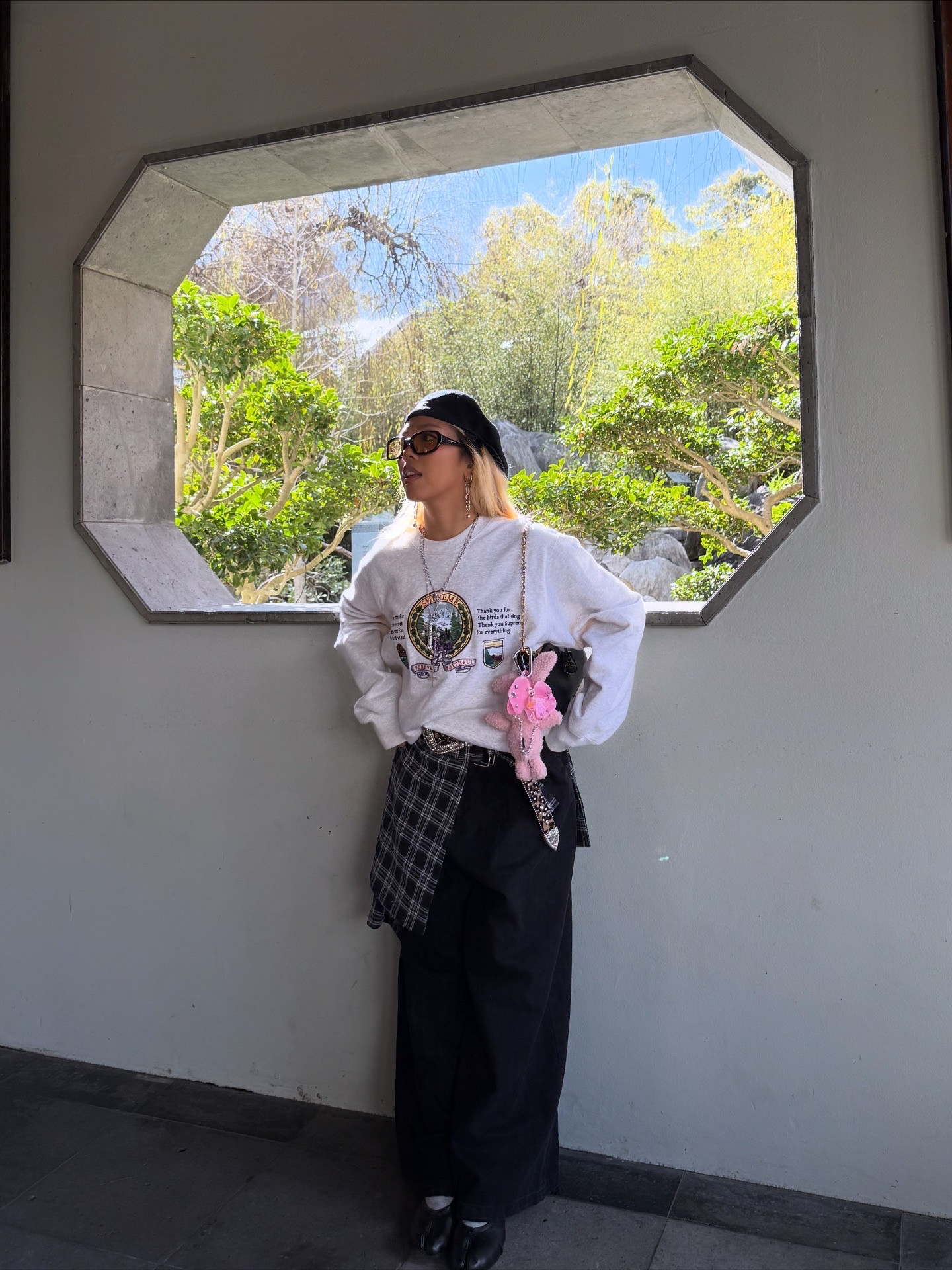 me throwing fits this year :) 💗 OUTFIT DETAILS - Hat: Kangol, Earrings: OHTNYC (similar item linked), Necklaces: En Route Jewelry, Sweatshirt: Supreme (similar items linked), Bag: Prada, Skirt: Hide (similar item linked), Pants: Enoch (similar item linked), Shoes: Maison Margiela, Belt: thrifted (similar item linked) 

 #LTKPetite #LTKStyleTip #LTKTravel