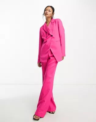 Vila tailored asymmetric blazer and flared pants set in bright pink | ASOS (Global)