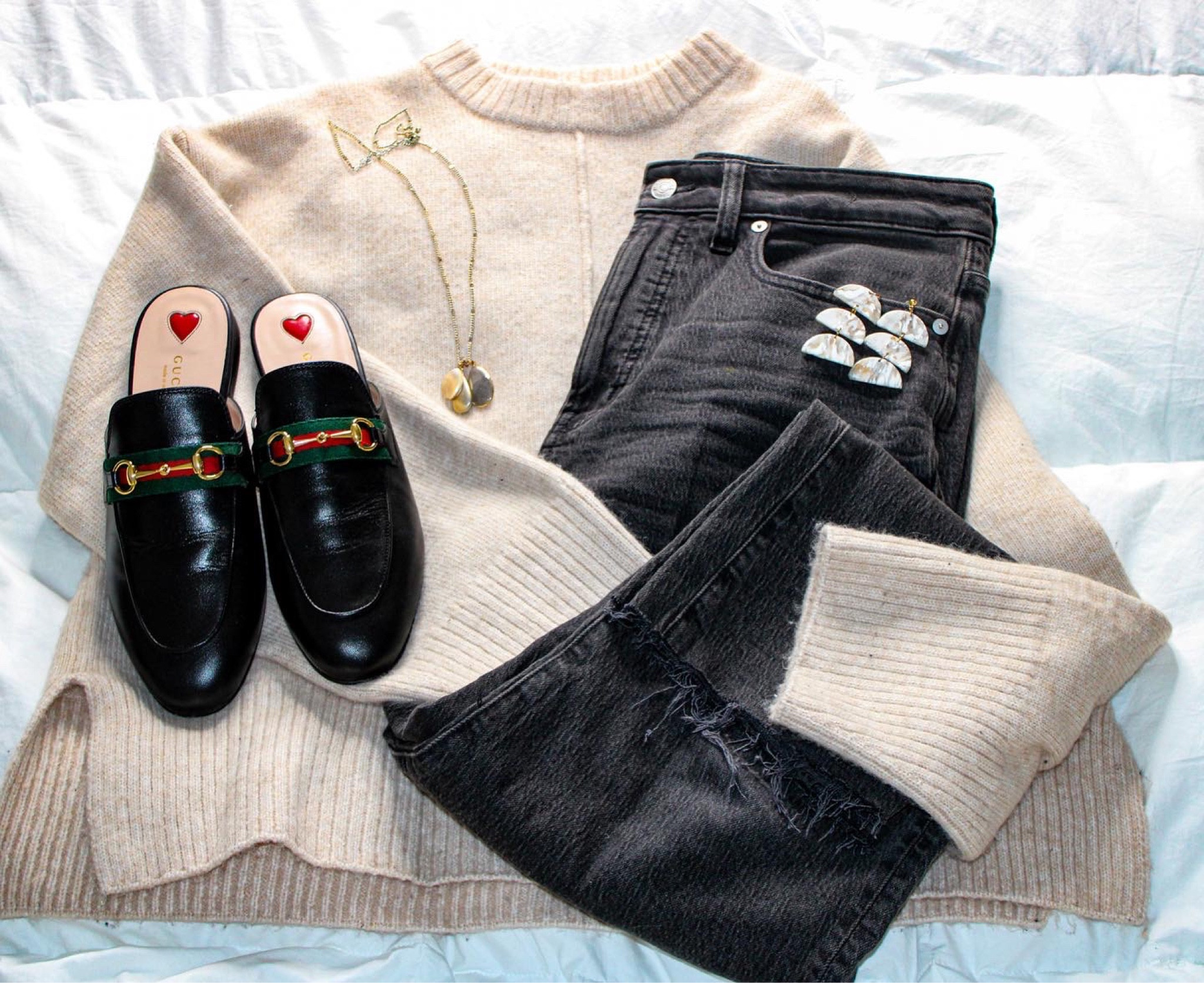 This outfit is perfect for a casual Friday or a great date night!

#blackjeans #mules #creamsweater #datenight #casualwear 

#LTKstyletip #LTKunder50 #LTKU