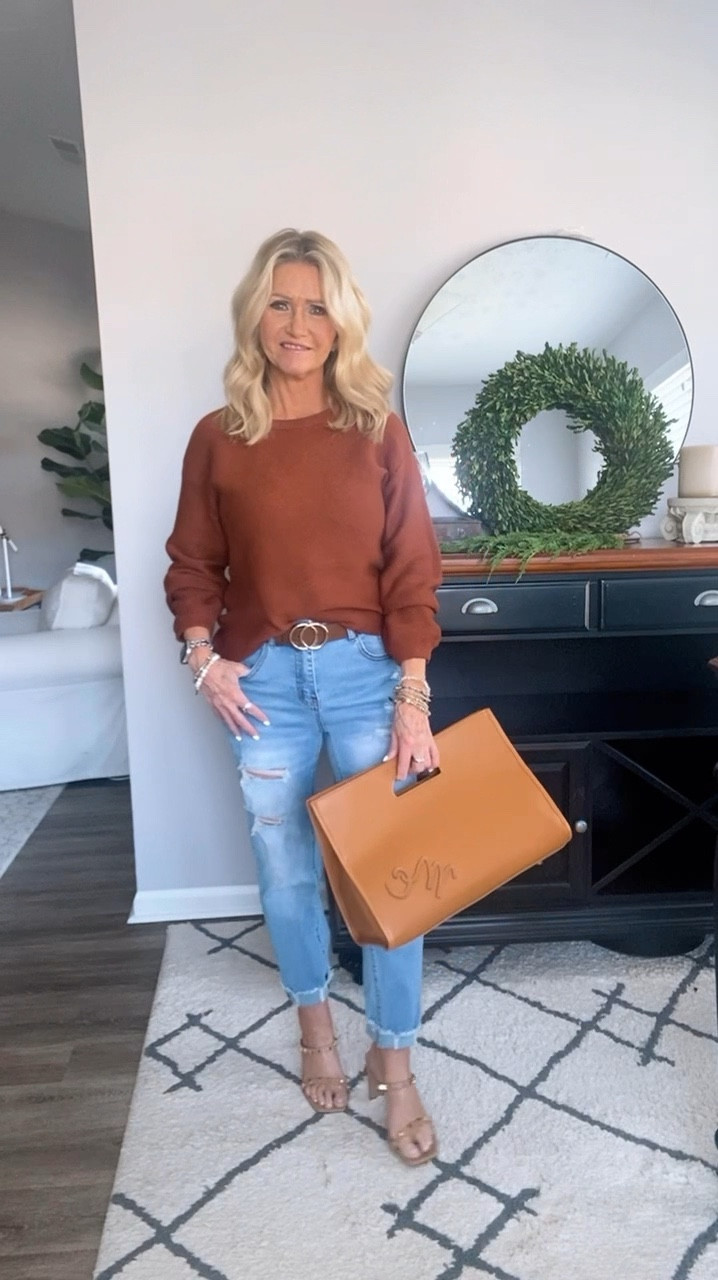 🦃Thanksgiving outfit inspo 🍂✨ Stay cozy and chic with this rust sweater, distressed jeans, and brown boots combo. Add a classic belt and your favorite handbag to tie it all together. Perfect for a day of gratitude, good food, and style! 🧡 Wearing small in sweater and jeans for size reference 
#ThanksgivingOutfit #FallStyle #Farmhouse40

#LTKFindsUnder50 #LTKStyleTip #LTKBeauty