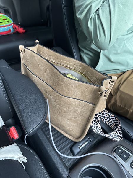 This purse is only $35.99 and it’s SO great for quick errands with baby - fits a full size wallet, two diapers, full size wipes, a baby water bottle and a toy or two! It even has a zip closure. 

#LTKbaby #LTKitbag #LTKkids