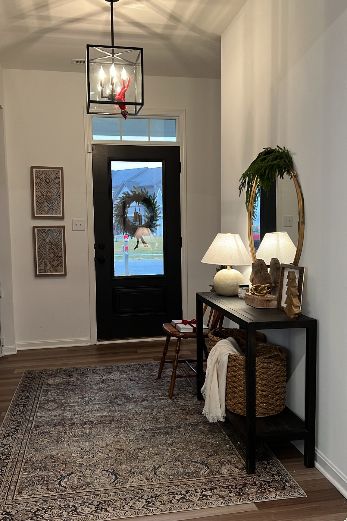 Entryway vibes ✨ 

Unfortunately my console is gone. It was clearance at pottery barn and I can’t find it on the site anymore!  

Table lamp, wall art, chandelier, round mirror, entryway rug, loloi rug 

#LTKhome #LTKHoliday #LTKSeasonal