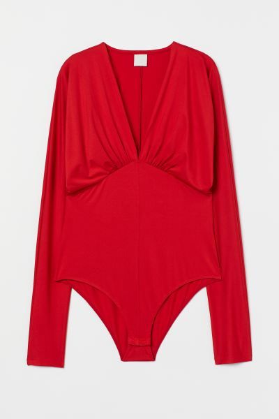 Long-sleeved bodysuit in jersey. Low-cut V-neck and an angular, gathered seam at waist for a drap... | H&M (US)