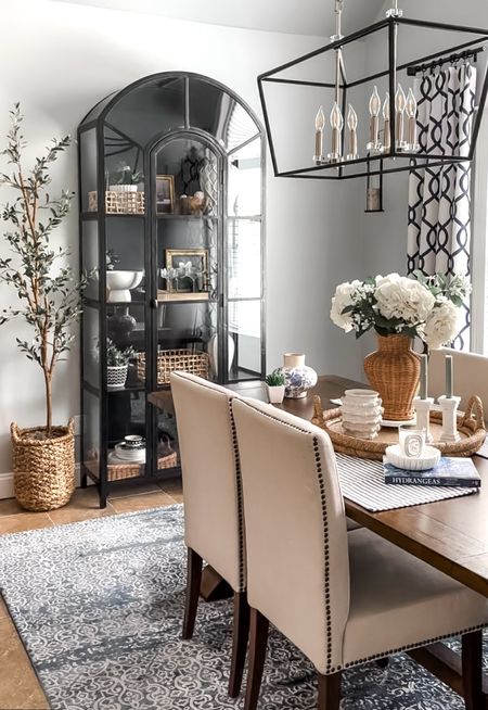 Spring dining room refresh. Shop florals, marble candleholders, hydrangeas book, tray, marble dish, baskets, vases, side chairs, wood table, elegant chandelier, black display cabinet, faux olive tree. Spring home decor accessories. 

#LTKfindsunder50 #LTKhome