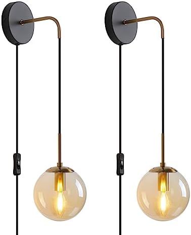 Wall Sconces Set of Two Black and Gold Plug in Wall Sconces Set of 2 with Globe Amber Glass Shade... | Amazon (US)