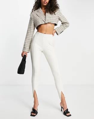 Topshop faux leather skinny pants with front hem slits in off white | ASOS (Global)