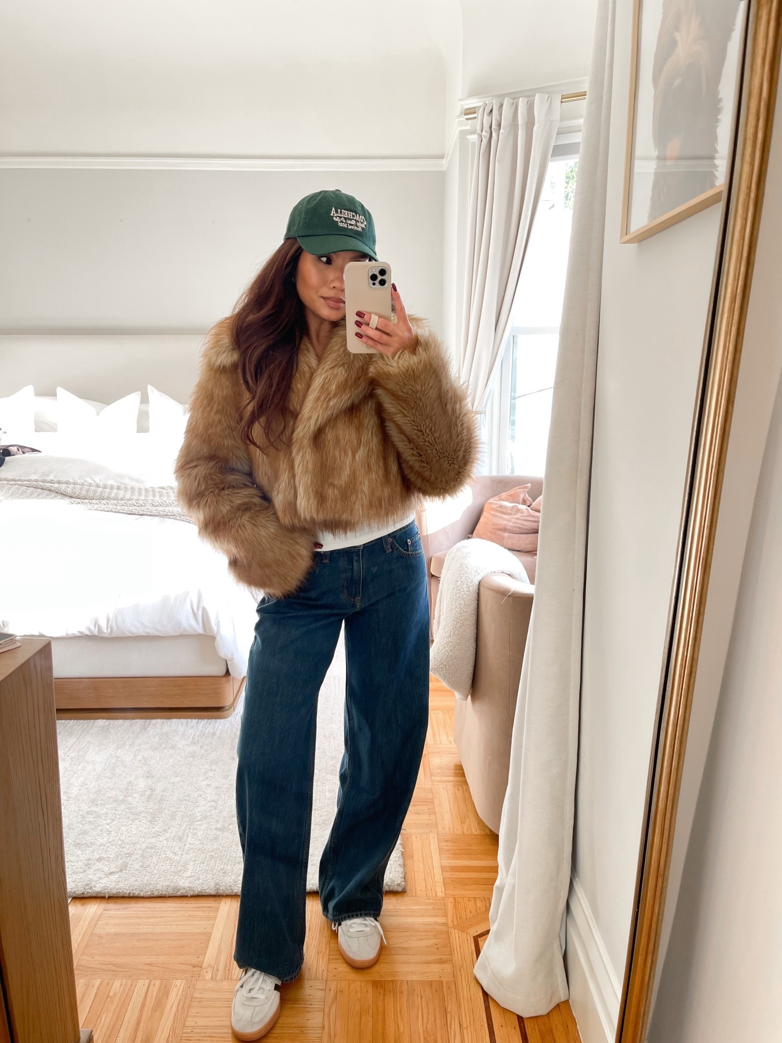 Casual way to style your faux fur jacket! With loose jeans sneakers and a baseball hat 

Sizing:
Jacket - wearing small, no xs option
Long sleeve - old linked similar 
Jeans - dark wash, 25 short, these run a bit bigger than my light wash! So I wish I did 24 short in the dark
Sneakers - sized down 1/2 size 

#LTKFindsUnder100 #LTKPetite