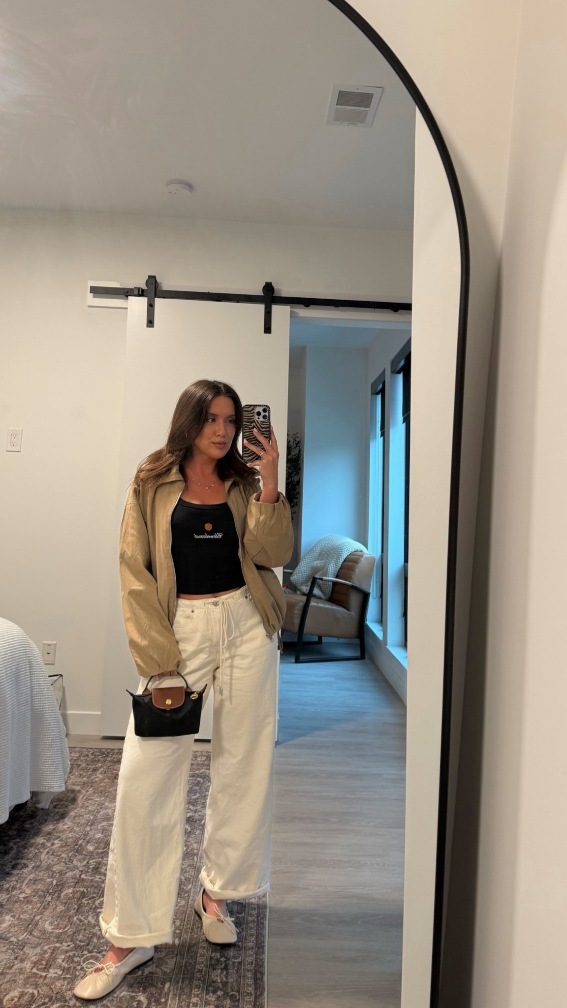 Basketball game outfit 🏀 
Jeans / 28
Jacket / M
Tank is from Emily Roggenburk 

#LTKootd