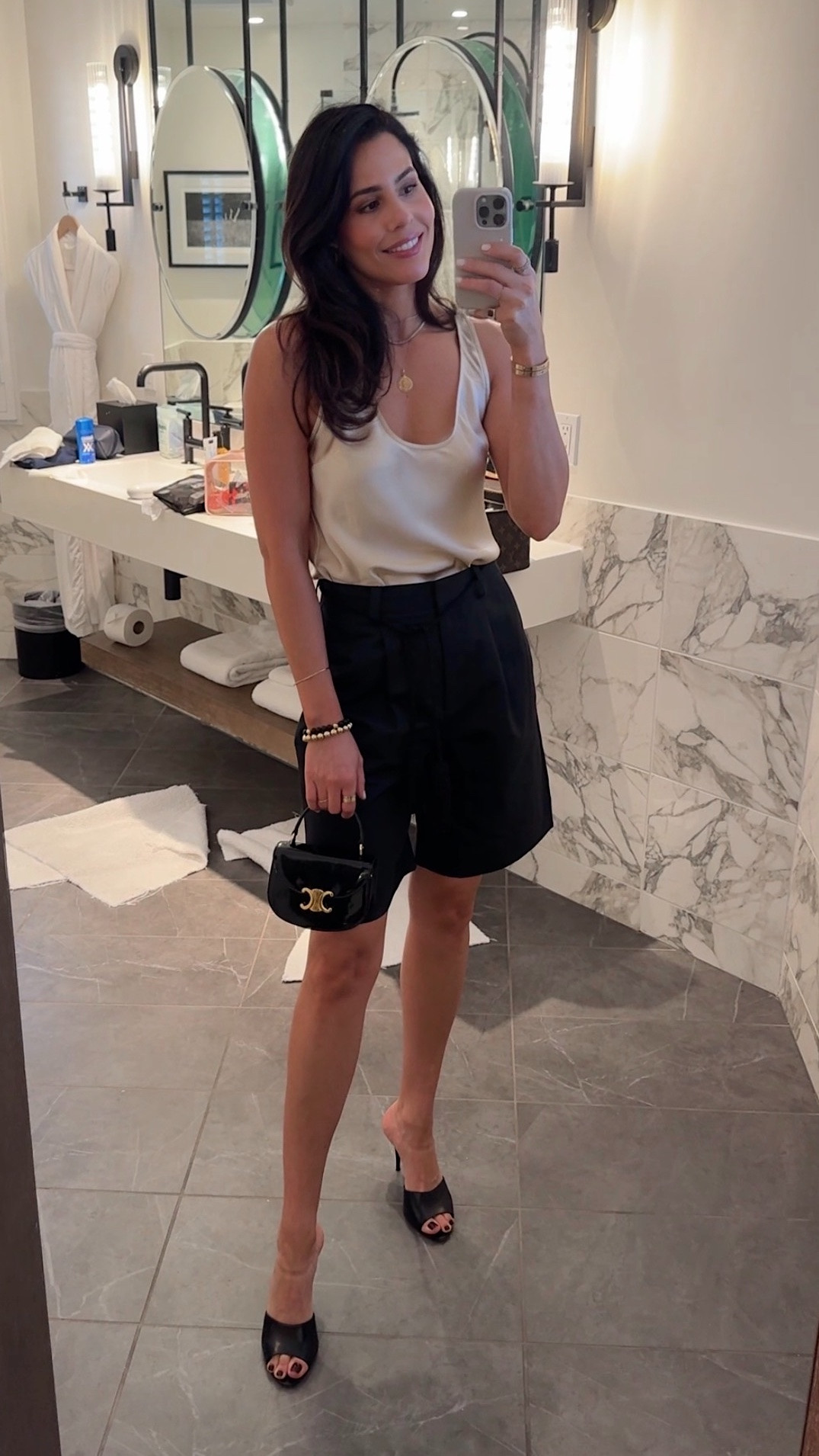 Almost summer nights in Napa call for elevated staples. Tailored linen long shorts are officially the chic silhouette of the season, especially with a polished knee-length fit and statement details like this tassel belt. Paired with a silk scoop-neck tank in the prettiest almond ivory tone, bold gold-and-black earrings, and my Vivrelle bag of the month.
And these Saint Laurent heels? Forever a favorite. Timeless, chic, and somehow go with everything.
Use my code DIANACAROLINA for your first month free with Vivrelle 🤍 

 #LTKootd #LTKTravel #LTKOver40