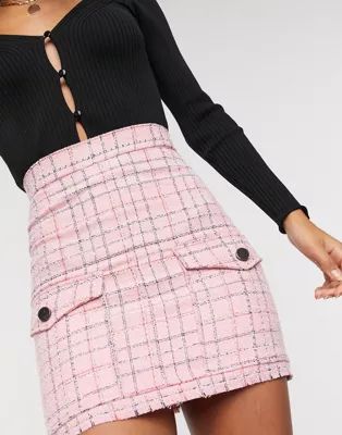 ASOS DESIGN textured boucle mini skirt with check design in pink | ASOS (Global)