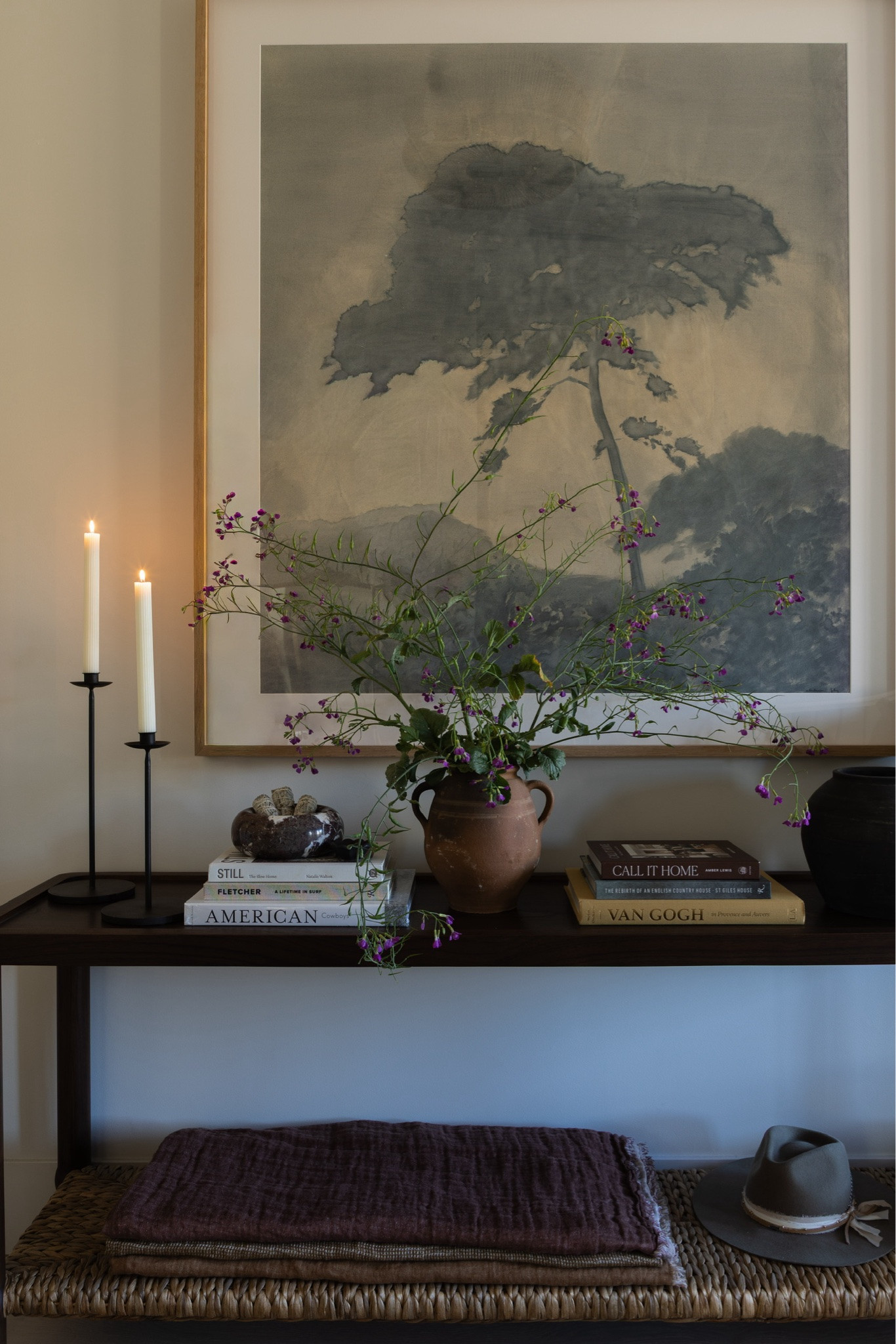 Styling our entryway! These coffee table books are such an easy way to dress up the space.