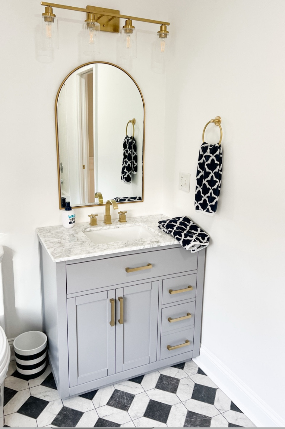 Bathroom vanity, mirror, bathroom hardware, light fixture 



#LTKHome