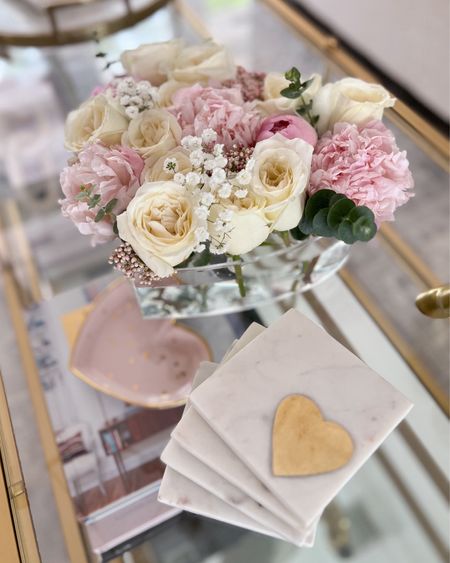 Floral arrangement in the cutest heart acrylic vase for Valentine’s Day! 🥰 it comes in different shapes & sizes. 

Amazon finds, home decor, Valentine’s Day, Galentine’s day, coffee table decor, gift ideas for her, fancythingsblog 

#LTKfindsunder100 #LTKhome #LTKfindsunder50