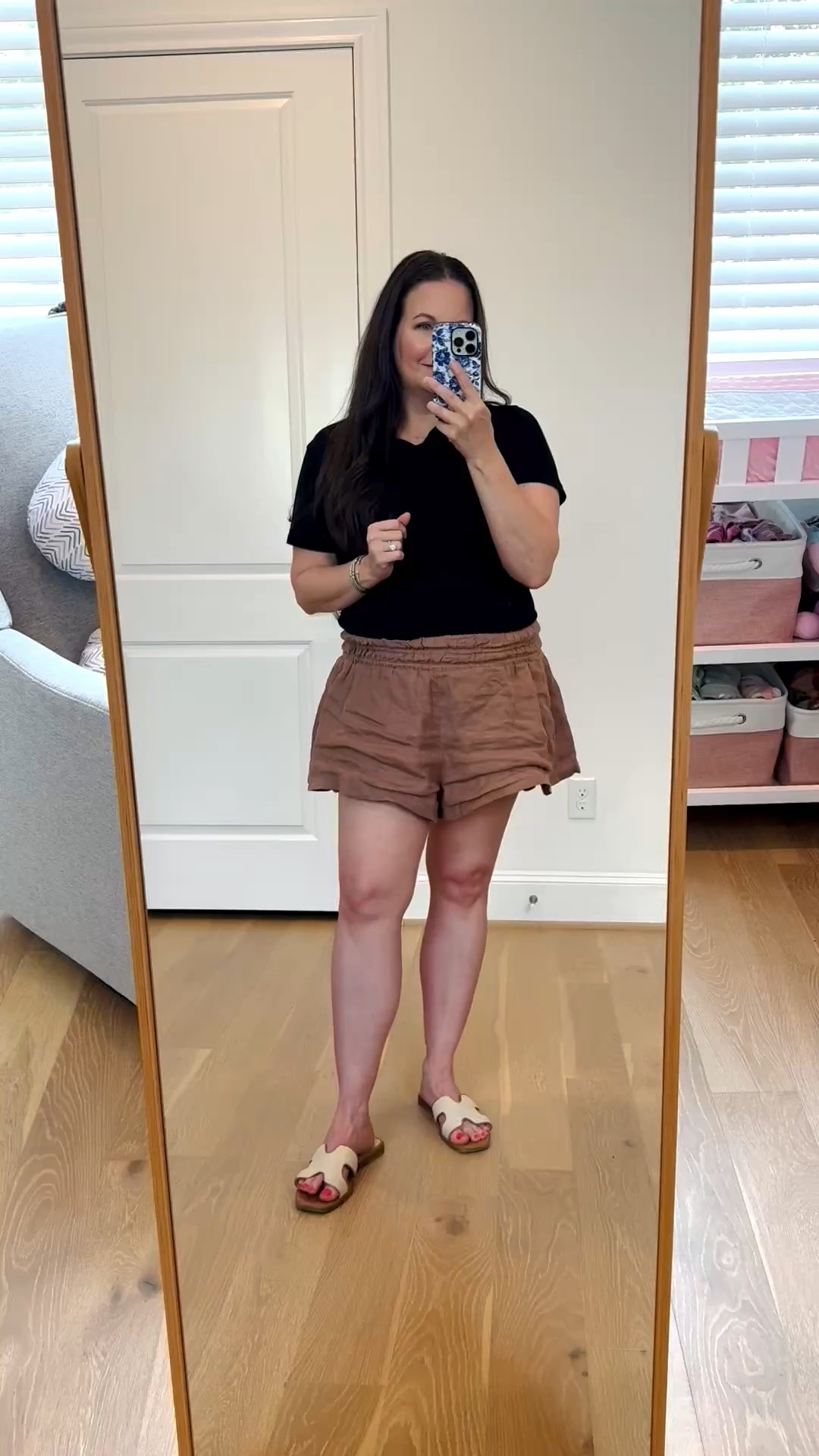 These brown linen shorts with a comfortable stretch waist are a must-have for effortless summer outfits. Styled with a classic black tee, this easy summer outfit is perfect for everything from everyday errands to weekend brunch and sightseeing on vacation. If you’re building a capsule wardrobe, this versatile look is ideal for vacation outfits, casual everyday style, and comfortable summer outfits over 40. Simple, flattering, and practical, it’s an easy mom style outfit you can dress up with sandals or keep casual with sneakers all season long.

#LTKSeasonal #LTKOver40 #LTKootd