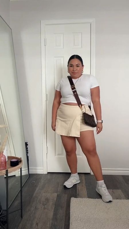 30 Days of Outfits: Day 23 is another neutral look 🤍 if you have a cargo skirt this look would be great for summer 

White tshirt, cropped tshirt, cargo skirt, wrap skort, new balance sneakers, summer outfit, spring outfit 

#LTKSeasonal #LTKunder50 #LTKsalealert