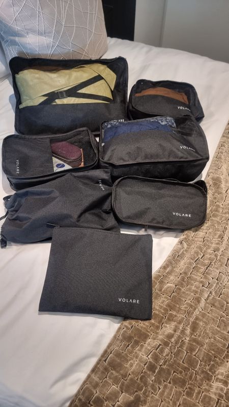 Up your travel organisation with these Volare black organisation bags. They come a 7piece set.PACK MORE INTO YOUR TRIP Find what you need when you need it. Segment your clothes and travel goods. Whatever you’re packing, you can find it with ease no matter where you are.✅ CONQUER THE CHAOS Turn the chaos of your suitcase into an organised portable wardrobe. 7 different packing cubes create different sections for all your outfits and possessions.✅ INTERNAL AFFAIRS Travel in style, whether for work or play. Sleek black packing cubes are adorned with a subtle branded logo for seamless style, whether you pack by outfit or item.✅ LAST A LIFETIME The Volare Packing Cubes come with a 100% satisfaction guarantee and are designed to last with premium water-resistant material, heavy duty mesh and long-lasting zippers.✅ DITCH THE STRESS Our packing cubes compress and organize everything inside your suitcase, from socks to shirts to even your bulkiest items allowing you to simply unpack your pre-organised packing cubes.

#LTKitbag #LTKtravel #LTKeurope