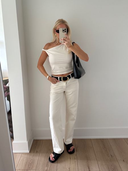 Easy Summer Outfits - Wearing a small in Abercrombie top (exact color sold out, linked similar), 26 in Levi’s jeans, small in belt, half size down in sandals (I did a 7)! #kathleenpost #easysummeroutfits #casualoutfits #summerlooks#LTKSaleAlert #LTKStyleTip

#LTKSeasonal